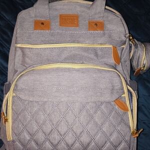 Gray Quilted Backpack with Tan Accents